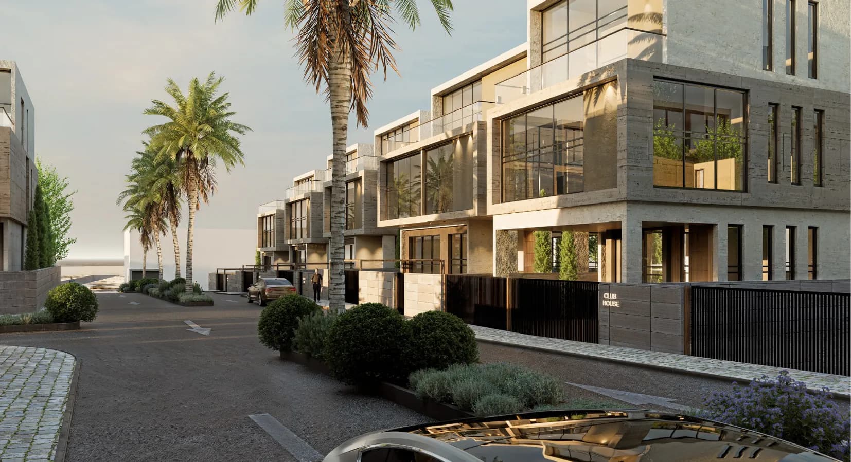 Tree-lined internal street with villas and landscaped verges