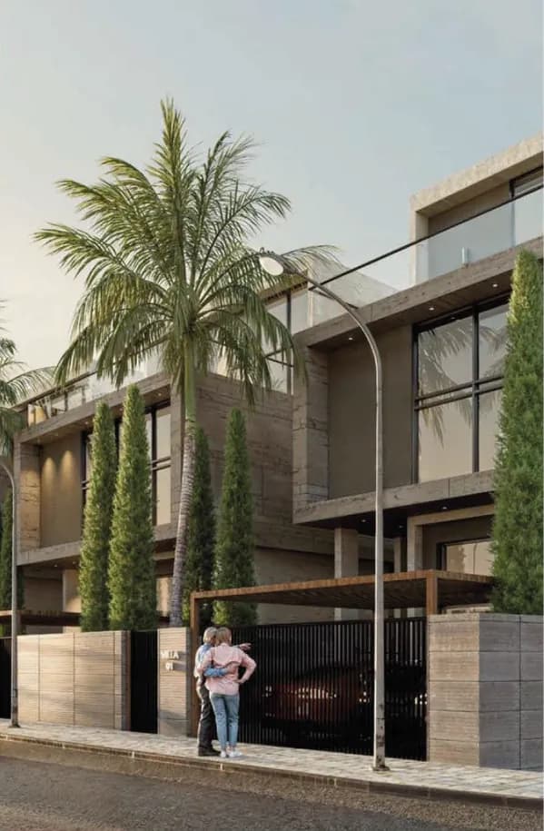 Villa frontage with palm trees and private gated entrance