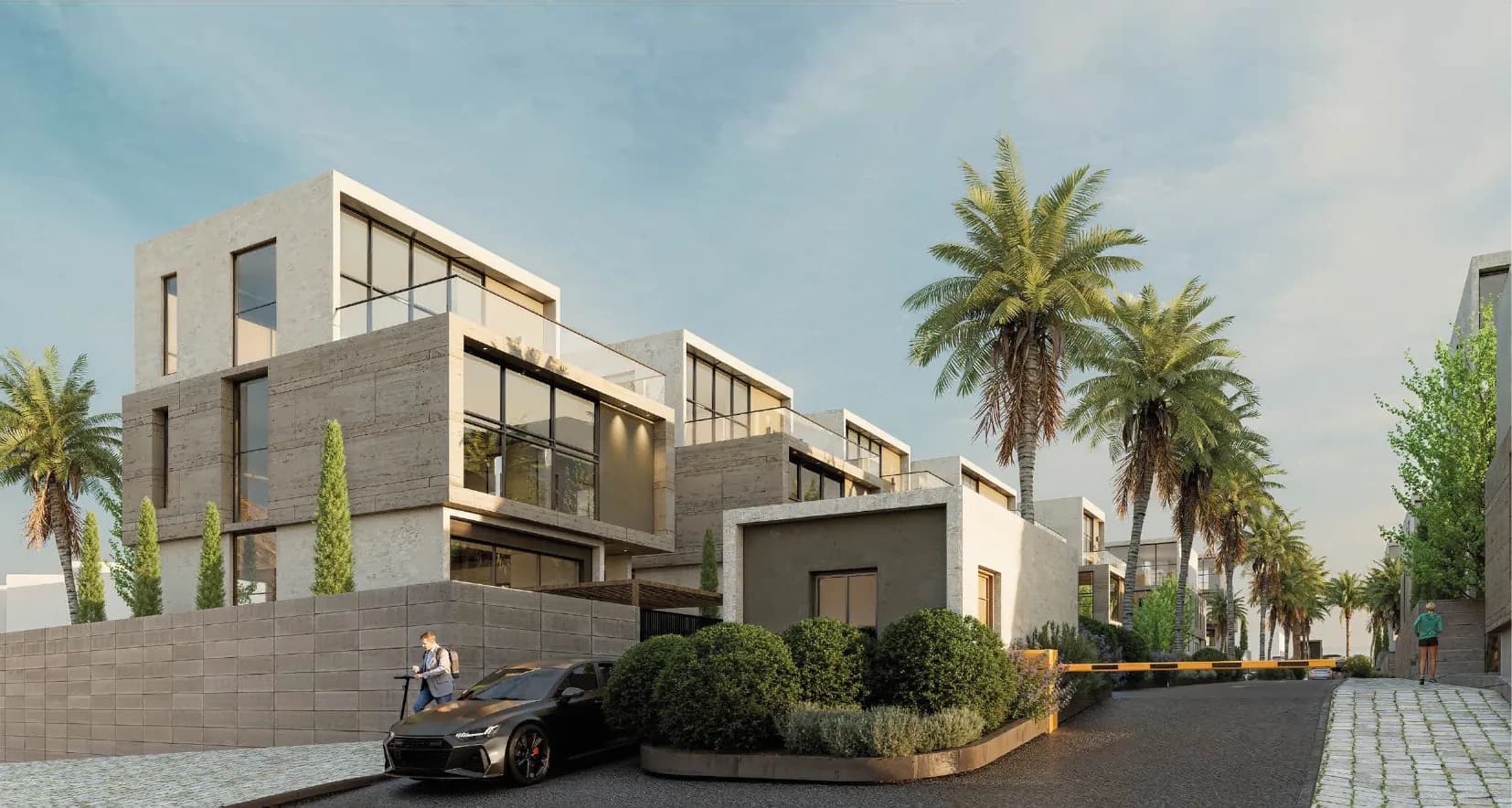 Villa entrance with landscaped planting and gated access